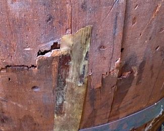 Lot 2217. $50.00. Neat Old wood stave barrel w/ metal bands. Great for Storage. As is. Has 2 small breaks in the stave. Great vintage patina! Fun in a garden to hold a plant.