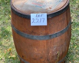 Lot 2217. $50.00. Neat Old wood stave barrel w/ metal bands. Great for Storage. As is. Has 2 small breaks in the stave. Great vintage patina! Fun in a garden to hold a plant.