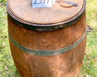 Lot 2217. $50.00. Neat Old wood stave barrel w/ metal bands. Great for Storage. As is. Has 2 small breaks in the stave. Great vintage patina! Fun in a garden to hold a plant.