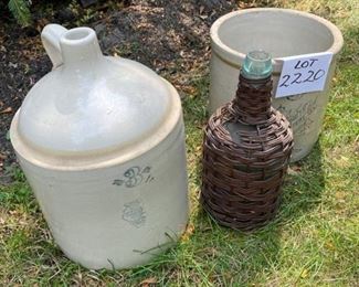 Lot #2220. $250.00. 3 gallon, Super Nice Monmouth IL. Pottery Crock- No cracks. 3 gal. SP+S Illinois Pottery (Whitehall, IL) jug. Exterior chips at the bottom- no cracks. 1 gal glass wine jug in wicker