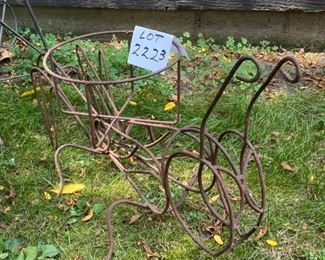 Lot 2223. $65.00. Wire planter lot. Iron Grasshopper Planter (25"w x 15"t) holds 10" terra cotta planter. Antique Wire Planter (24" round, 34" tall) - Fun items for your vintage garden. Love the grasshopper planter! better fitting inserts for this, maybe some coconut husks? So many options!