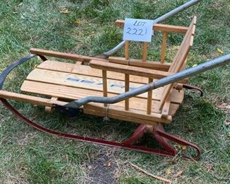 Lot #2221. $47.50. Vintage Sears Wooden Toddler Sled w/folding handle + runners. Also comes with seat cover to keep your tot warm on the sledding hills.