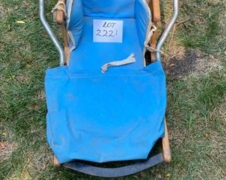 Lot #2221. $47.50. Vintage Sears Wooden Toddler Sled w/folding handle + runners. Also comes with seat cover to keep your tot warm on the sledding hills.