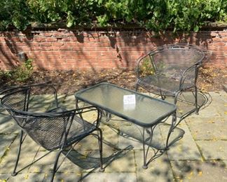 Lot 2301 $95.00 Woodard wrought iron w/wire mesh armchairs and cocktail/conversation table. Perfect for a balcony or small patio. Chairs eventually will need a spray of Rustoleum, but in good condition, and overall Great DEAL! Table: 36"L x 18"W x 18" H BTW. Woodard is one of the finest manufacturers of outdoor furniture in the U.S. Expect this set to last for many years!