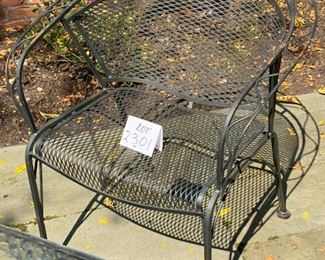 Lot 2301 $95.00 Woodard wrought iron w/wire mesh armchairs and cocktail/conversation table. Perfect for a balcony or small patio. Chairs eventually will need a spray of Rustoleum, but in good condition, and overall Great DEAL! Table: 36"L x 18"W x 18" H BTW. Woodard is one of the finest manufacturers of outdoor furniture in the U.S. Expect this set to last for many years!