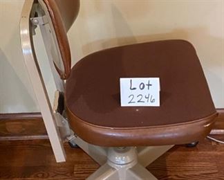Lot 2246. $50.00. Cool Vintage Industrial Style Task or Office Chair. Our guess is it is from the 1950s. The chair adjusts in Height on a screw. They don't make 'em like this anymore!