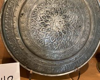 Lot 2248B $65.00 Brass and Copper Hammered Plate w/Bird Detail from the Greek Islands and Brass Lantern with glass inserts and open bottom (ala a hurricane). Plate: 11.5" dia. Lantern 12"h x 5" diameter. Back view of Plate