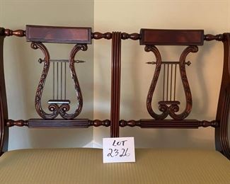 Lot 2326 $1,200.00. Vintage 1930-1940's Hand-Crafted Italian Mahogany Lyre-Back Settee with Scrolled Arms on hand-carved feet. Seat is upholstered in neutral striped gold fabric. Burled Wood Top with Brass or Copper Plate above the Lyre. Has Matching arm and side chair for nice grouping. See the next lots. 39.5"W x 34" H x 18"DS. Site online has this "on-sale" from $4,000 to $2,625.