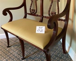 Lot 2326 $1,200.00. Vintage 1930-1940's Hand-Crafted Italian Mahogany Lyre-Back Settee with Scrolled Arms on hand-carved feet. Seat is upholstered in neutral striped gold fabric. Burled Wood Top with Brass or Copper Plate above the Lyre. Has Matching arm and side chair for nice grouping. See the next lots. 39.5"W x 34" H x 18"DS. Site online has this "on-sale" from $4,000 to $2,625.