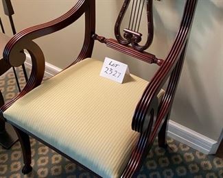 Lot 2327 $600.00 Vintage 1940's Hand-Crafted Italian Mahogany Lyre Back Arm Chair with Scrolled Arms on Hand-Crafted upholstered Seat. Burl Wood Top with Brass or copper plate above lyre. 23.5"W x 34" H x seat 18"H seat depth & height 18"
