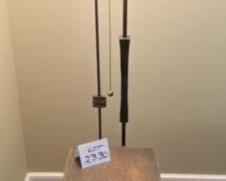 Lot 2330 $825.00 One of our favorites in the home. This Lamp is Very Special, Hand-Crafted Antique finished Brass Lamp with a Table. Artist-made, solid wand switch pull. Stunning Artistry! The homeowner paid a fortune this lamp, and we can see why! Includes a glass top, but we think this piece looks best without it. 62"T x 18.5"W x 18" D We took a ton of photos of this piece so you can ooh and aah over it from all sorts of angles.