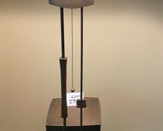 Lot 2330 $825.00 This Lamp is Very Special. Hand-Crafted Antique finished Brass Lamp/Table. Artist-made, solid wand switch pull. Stunning Artistry! The homeowner paid a fortune for this lamp, and we can see why! Includes a glass top, but we think this piece looks best without it. 62"T x 18.5"W x 18" D
