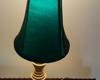 Lot 2332. $45.00. Mid-century brass bedside table lamp. Cool atomic ball feet. Needs a new shade, the green one (included) has a hole and needs to be replaced. Good Bones! 22" t x 6" w