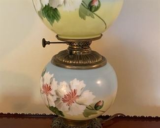 Lot #2331. $150.00. Beautiful Gone with the Wind Double Globe Lamp. Hand Painted flowers, blue and green with white flowers.