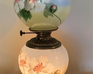 Lot #2331. $150.00. Beautiful Gone with the Wind Double Globe Lamp. Hand Painted flowers, blue and green with white flowers. This is definitely one of the prettiest GWTW lamps we've yet to see! 18"t x 8"d. Similar sell for $275.00 on line. Buy it now now now!