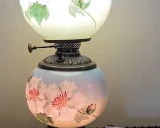 Lot #2331. $150.00. Beautiful Gone with the Wind Double Globe Lamp. Hand Painted flowers, blue and green with white flowers. This is definitely one of the prettiest GWTW lamps we've yet to see! 18"t x 8"d. Similar sell for $275.00 on line. Buy it now now now!