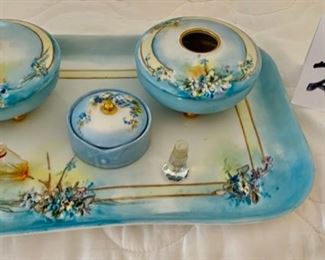 Lot 2343 $165.00 B&C France Hand-painted Limoges porcelain 7 pc dresser set. pin dish, cotton dish, trinket dish (with teeth) 1919 12" x 8.5" tray This is a beautiful set -