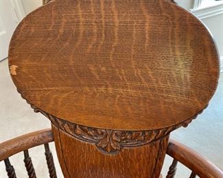 Lot 2344. $200.00. Oh, what a wonderful Antique Rocking Chair. Look at the woodwork, the turned legs, and supports under the curved arms! The head support and all the turned spindles. This is truly a piece of art! Now then, we have Lot # 2344. Victorian Quarter Sawn Oak Rocking Chair. Gorgeous - missing a small piece of veneer on top left. Even modern homes need to have a nice antique piece to give the home character. Buy this now, before you change your mind!
