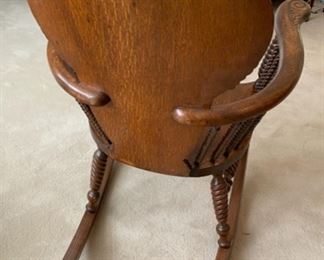 Lot 2344. $200.00. Oh, what a wonderful Antique Rocking Chair. Look at the woodwork, the turned legs, and supports under the curved arms! The head support and all the turned spindles. This is truly a piece of art! Now then, we have Lot # 2344. Victorian Quarter Sawn Oak Rocking Chair. Gorgeous - missing a small piece of veneer on top left. Even modern homes need to have a nice antique piece to give the home character. Buy this now, before you change your mind!