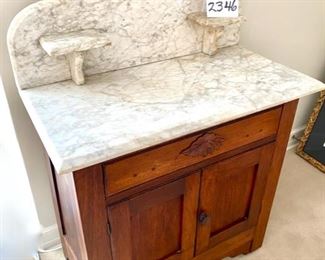 Lot 2346 $225.00 Fabulous Marble Topped Antique Cabinet. Antique Oak handle and two shelves. Marble has signs of wear and a crack, but sharp looking never the less. 30" W x 16" D x 39" H
