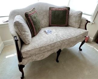 Lot 2347 $600.00. Upholstered Antique Settee w/Queen Anne Legs and Camelback design. This settee is in like-new condition! It was reupholstered and was beautifully redone in a current fabulous fabric. Seat depth 20" Seat H 19.5" Overall: 54"W x 34"H. Great piece for a Living Room or Bedroom Suite, or really any place that could use a stylish piece like this - plus it's sooo comfortable. Change the throw pillows to any color that matches your decor. You will not find a better loveseat or settee anywhere for this price!