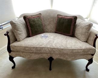 Lot 2347 $600.00. Upholstered Antique Settee w/Queen Anne Legs and Camelback design. This settee is in like-new condition! It was reupholstered and was beautifully redone in a current fabulous fabric. Seat depth 20" Seat H 19.5" Overall: 54"W x 34"H. Great piece for a Living Room or Bedroom Suite, or really any place that could use a stylish piece like this - plus it's sooo comfortable. Change the throw pillows to any color that matches your decor. You will not find a better loveseat or settee anywhere for this price!