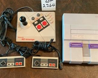 Lot 2264 $95.00 Super Nintendo Game Console, Nintendo NES Advantage Joy Stick Controller NES -026, 2 NES Nintendoo Controllers. Yay Nintendo!