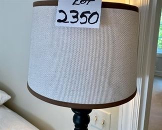 Lot 2350 $85.00. Tall and heavy floor lamp with brown lined frame. Base is Black rubbed bronze Lamp 58" tall x 13" diameter