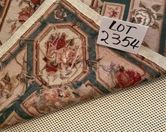 Lot 2354 $450.00. Beautiful Antique Hand-Crafted Needlepoint Runner. Lot 2354 $450.00. Beautiful Antique Hand-Crafted Needlepoint Runner. Owner paid more than $1100.00 Includes liner cut to size. 29" W x 92" L