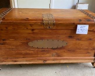 Lot 2309 $325.00. Cedar Trunk from 1800's Copper reinforced corners wheels on legs. The Interior is lined with raw cedar. No Key. GREAT PIECE! 45"W x 22"D x 22"H