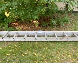 Lot 2310. $60.00 Aluminum 28 ft extension ladder. Werner Saf-T Master