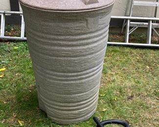 Lot 2311 $90.00. Fiskars Rain Barrel. www.rain-barrel.com w/hose + pump + spiggot.