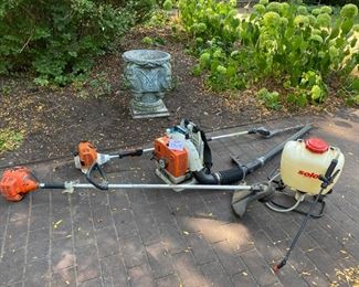 Lot 2315 $300.00 Landscaping Special! Its a Steal (see what I did there!) Stihl BR400 Gas Blower. Stihl HL100 Tree Trimmer, Echo SRM-2300 Trimmer, and Solo Back Sprayer. May need a tune-up on the motors. (Planter in rear of photo is from an earlier lot).