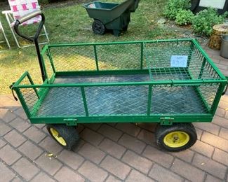Lot 2318 $90.00 Utility Wagon w/drop down sides, front handles and back hitch. Plus 24"x15"tray. 48"L x 24"W x 16" wagon top