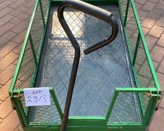 Lot 2318 $90.00 Utility Wagon w/drop down sides, front handles and back hitch. Plus 24"x15"tray. 48"L x 24"W x 16" wagon top