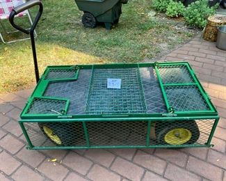 Lot 2318 $90.00 Utility Wagon w/drop down sides, front handles and back hitch. Plus 24"x15"tray. 48"L x 24"W x 16" wagon top