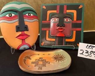 Lot 2389 $44.00 Laurel Burch Wall Hangings (11 3/4" x 9" & 11"w x 11.5"lx 2"d) and a Terracotta Platter/Dish (9.5"L x 6.5"W). Colorful display!