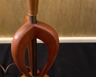 Lot 2392 $85.00 Vintage Danish/Mid-Century Modern Teak Architectural Table Lamp. Tested. Metal Accents could use some elbow grease to polish up. 27 1/4" H x . 6.5" Round base. Super cool lamp should appeal to those who collect Danish Modern Furnishings.