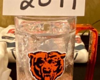 Lot 2399. $30.00. Superbowl '85 Lot. 2 Sz "Lg." (this is an 80's large not 2020 large) super bowl XX sweatshirts, 1 LG NFC Champs Sweatshirt, and a "frosty" mug. Coordinates well with Lot 2107.