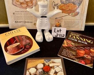 Lot 2412. $40.00. Makemyday cookbook holder, 2 antique Ladies Home Journal Vintage Prints (Kraft Cheese and Canning), 3 cookbooks (cheese and canning, obviously)