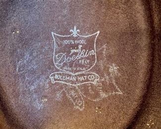 Lot 2415. $45.00. 2 ladies wool hats. 1) 100% wool felt hat, brown with gold-toned metal dots and herringbone chain. 2) 100% wool felt hat, black with brass tone ring around the hat.