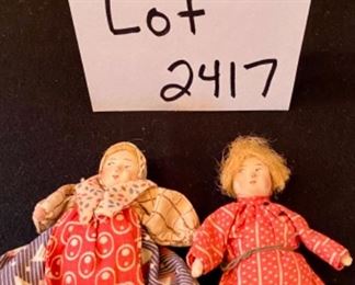 Lot 2417. $40.00. Hummel Collector Plate, 5 bisque Village People 😂 (One is a mini-toby mug), 2 small dolls made in Soviet Union, one porcelain face doll ornament.