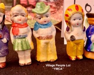 Lot 2417. $40.00. Hummel Collector Plate, 5 bisque Village People 😂 JK. (One is a mini-toby mug), 2 small dolls made in the Soviet Union, one porcelain face doll ornament.