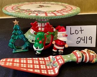 Lot 2419. $20.00. Musical Christmas Cake Plate (We wish you a merry christmas), matching Cake Spatula, 2 christmas napkin holders (we are adding the tree napkin holder to Lot 2490).