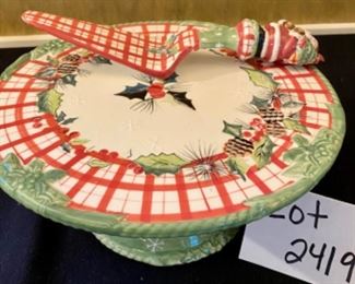 Lot 2419. $20.00. Musical Christmas Cake Plate (We wish you a merry christmas), matching Cake Spatula, 2 christmas napkin holders (we are adding the tree napkin holder to Lot 2490).