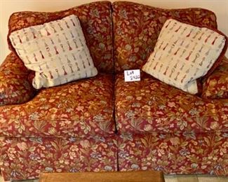 Lot 2422 $475.00. Pearson Camelback Love Seat, Down-filled w/attractive modern floral in deep red, tan, green, gray upholstery. Includes 2 pillows in the picture. 60"L x 34" D x 35"H