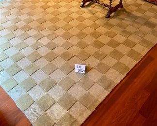 Lot 2424. $350.00. 100% pure wool pile rug, handmade in India. By Aura International 7'6" x 9'6" (Note: Bench in this picture is included in Lot 2341).