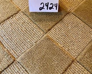 Lot 2424. $350.00. 100% pure wool pile rug, handmade in India. By Aura International 7'6" x 9'6" (Note: Bench in this picture is included in Lot 2341).