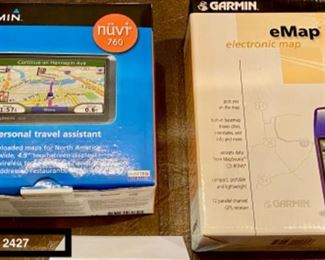 Lot 2427 $36.00 Nav Package includes: Garmin nuvi 760 (missing window Bracket and New Garmin Handheld eMap (electronic map) in open box.