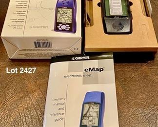 Lot 2427 $36.00 Nav Package includes: Garmin nuvi 760 (missing window Bracket and New Garmin Handheld eMap (electronic map) in open box.